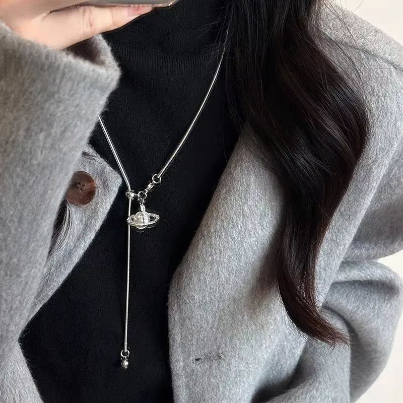 Hot Sale of the Season Pearl Saturn Pendant Necklace Adjustable Titanium Steel Sweater Chain Women'S Fashionable Jewelry Accesso